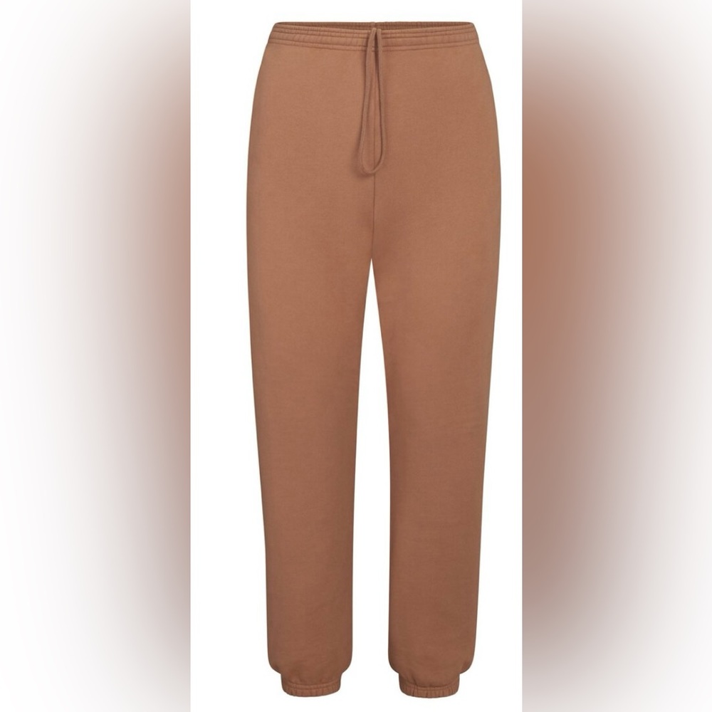 EUC SKIMS Outdoor Fleece Jogger Tigers Eye size Large L